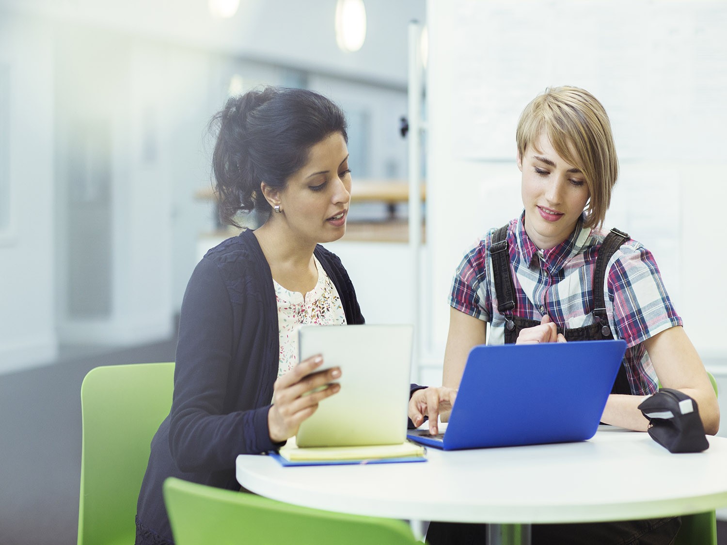 Student and supervisor go over work study information.